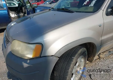 2001 Ford Escape Xlt z USA, uszkodzony, nr VIN 1FMCU04101KB58456